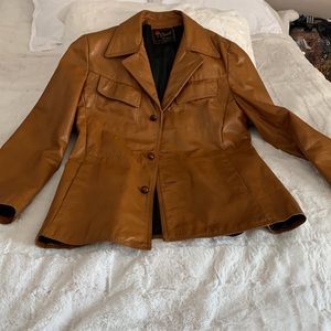 Vintage cognac leather coat by Reed Sportswear. Size M